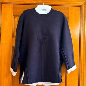 Oliver Bonas navy knit sweater with pale pink accents